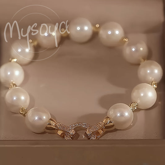 Beautiful handmade bracelet crafted with freshwater pearls, suitable for both formal events and everyday wear. Makes a wonderful gift for holidays like Christmas and Valentine's Day, as well as other special occasions.