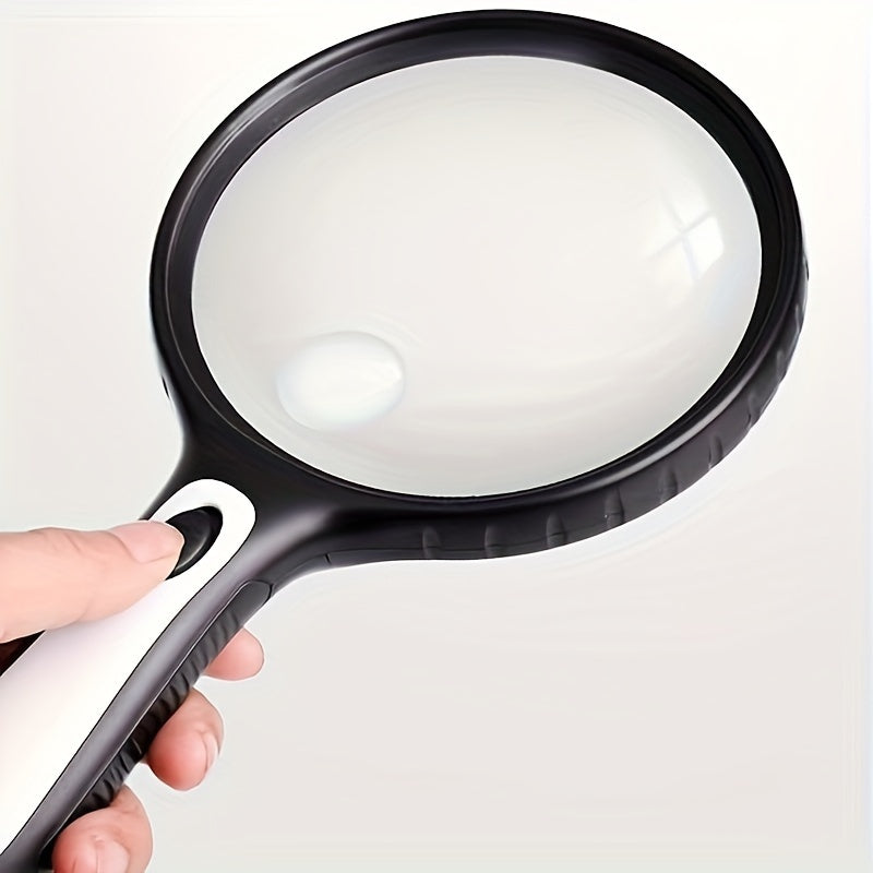 LED-Lit handheld magnifying glass with high power (30X/60X) ideal for seniors, youngsters, and low vision readers.