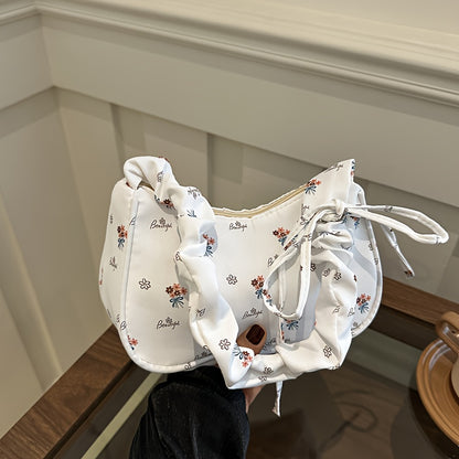 Stylish white and pink floral crossbody bag for women, suitable for daily use, travel, or as a gift.