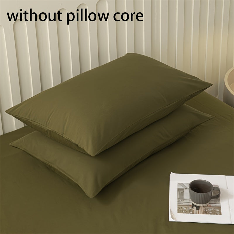 Get two ultra-soft brushed polyester pillowcases, weighing 90g each in a sleek light purple color. These rectangular pillowcases measure 50.8x76.2cm and feature an envelope closure. They are machine washable and perfect for adding cozy comfort to your