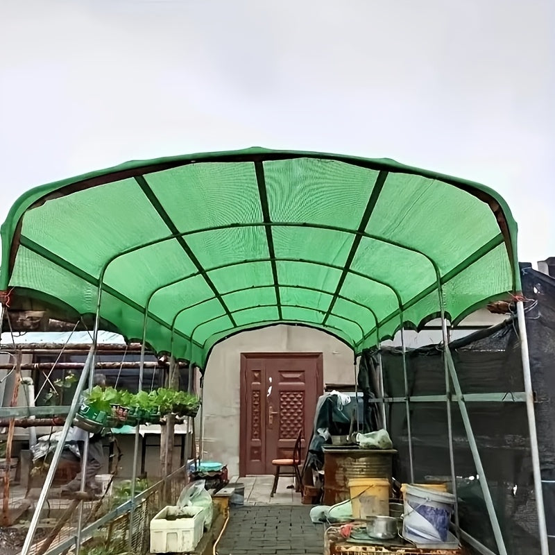 Large green sunshade net for outdoor use in pool, garden, or balcony. Water-resistant fabric, suitable for all seasons, with hook and loop closure.