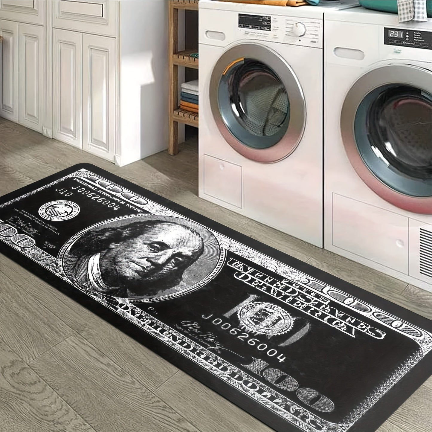 Transform your hallway with this stylish 1-piece Dollar Bill Runner Carpet in black and white. Perfect for adding a modern touch to your kitchen decor or bedroom, this non-skid rug is sure to enhance your home's ambiance.