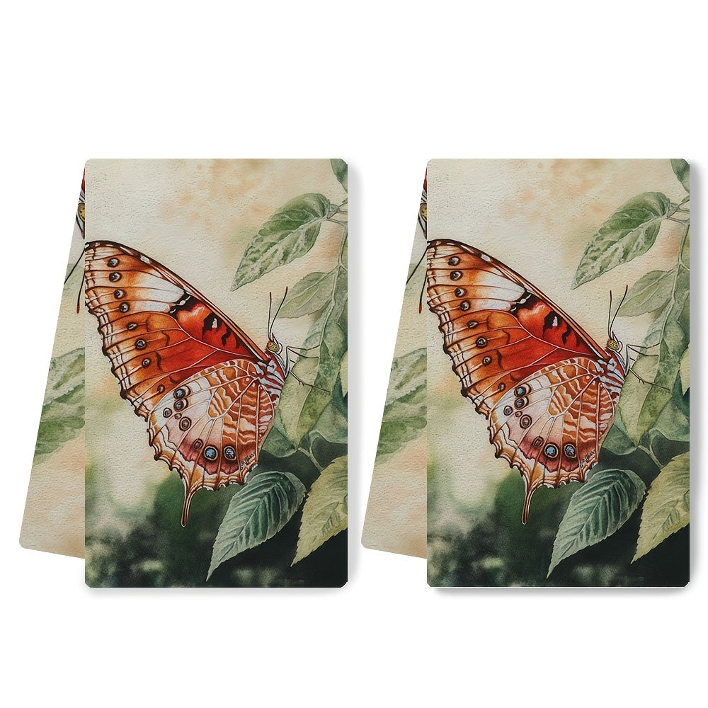 Two pieces of ultra soft kitchen towels featuring a vibrant butterfly design. These highly absorbent and machine washable dish hand towels are perfect for adding a contemporary coastal decor to your kitchen. Each towel measures 40.64x60.96 cm.