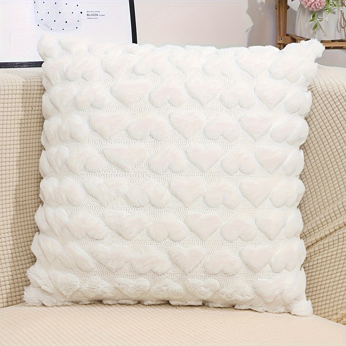 One set of cute beige decorative throw pillow covers, 18x18, made of soft plush faux fur wool for couch or sofa décor.