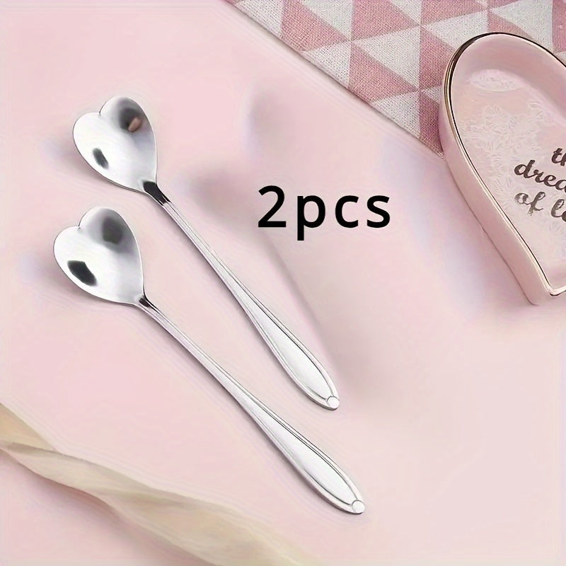 Celebrate love with 2 stainless steel coffee spoons shaped like hearts, the perfect gift for Valentine's Day. These creative spoons are perfect for stirring desserts and are ideal for Christmas parties, holidays, restaurants, and home use.