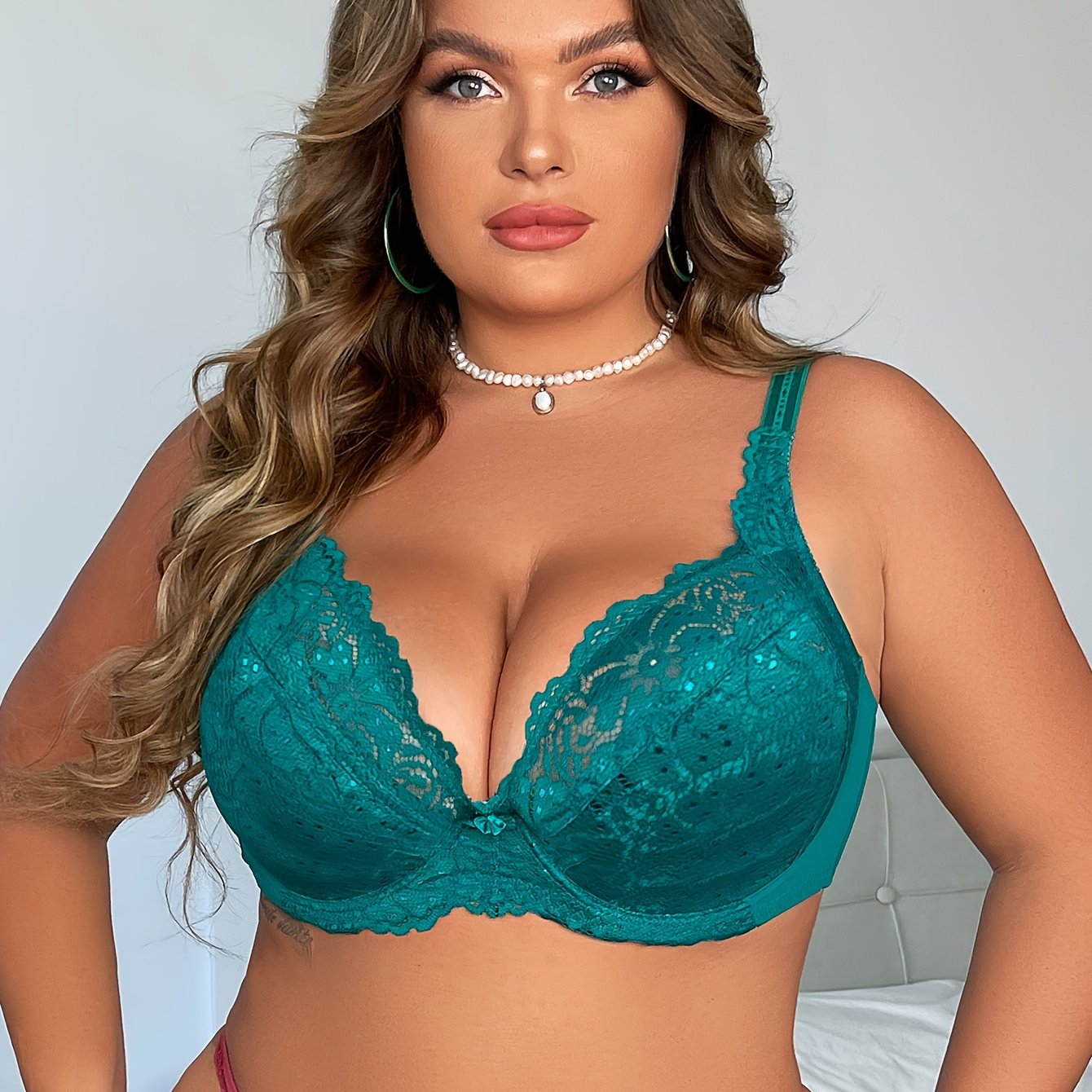 Sexy plus-size bra with lace trim and medium stretch for comfort