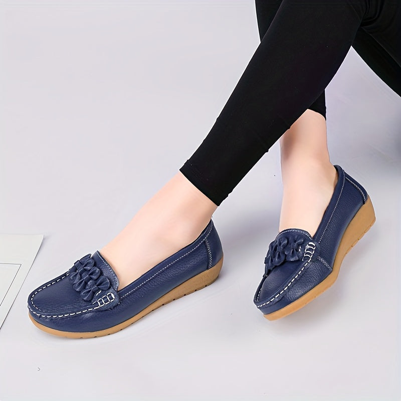 Women's flat shoes with bow detail, solid color, round toe, slip-on design for casual walking.