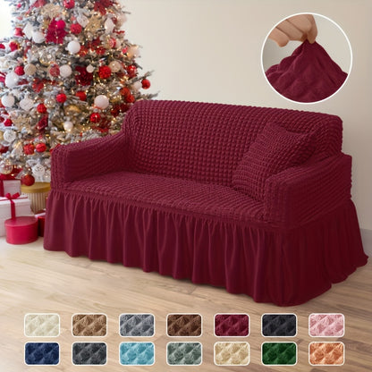 Non-slip elastic sofa cover with skirt for home decor.