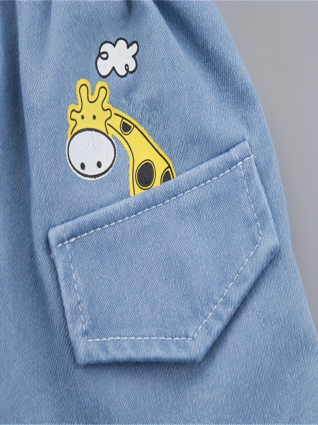 Baby boys' cute cartoon denim outfit for summer parties.