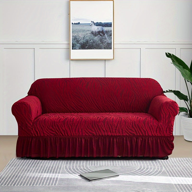 Wave pattern sofa slipcover with skirt, non-slip and dustproof. Protects furniture from cat scratches. Machine washable for easy cleaning. Suitable for bedroom, office, or living room décor.