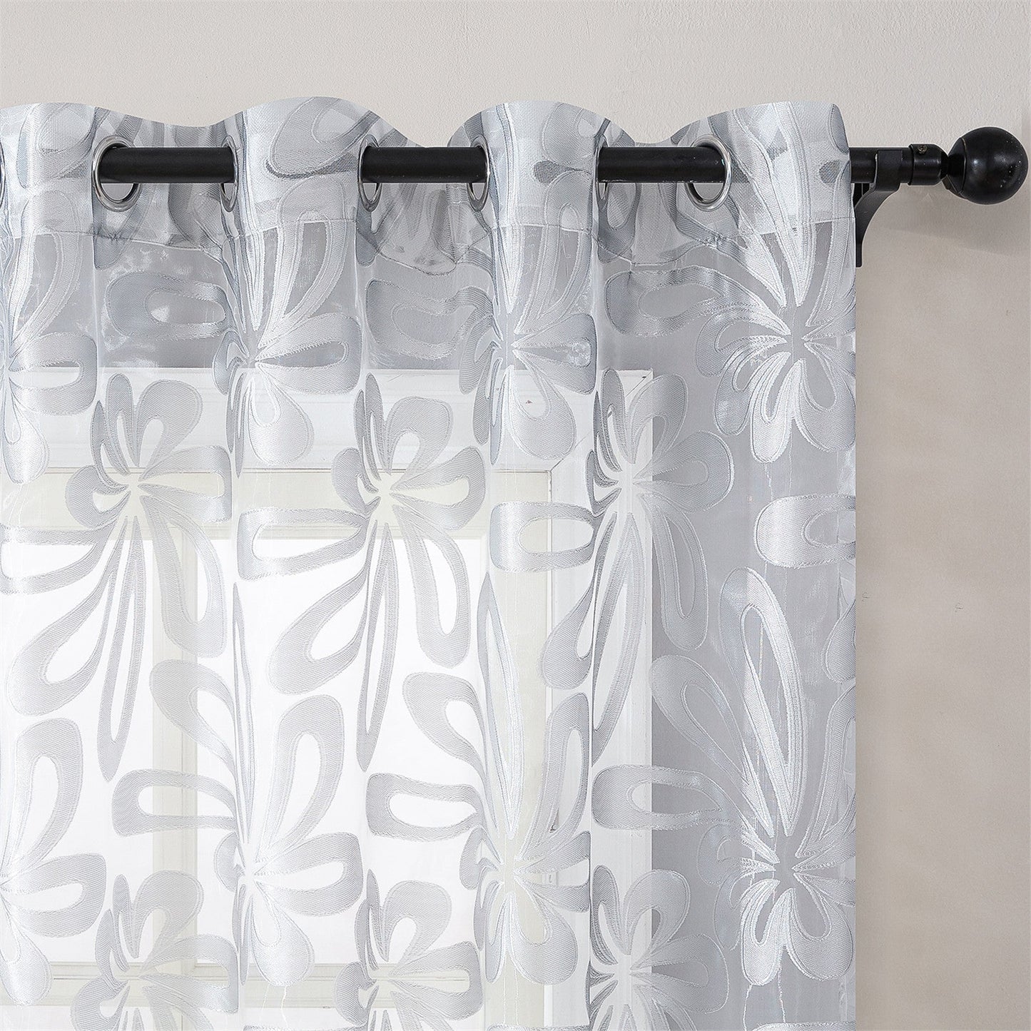 This Elegant Geometric Sheer Curtain Panel in Brown & White Floral Jacquard Design is made of lightweight polyester. It is machine washable and comes with eyelets for easy hanging. Ideal for enhancing the decor of your living room or bedroom.