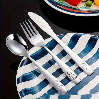 - Set of stainless steel flatware for youngsters
- Cartoon dinosaur design
- Silvery knife, fork, and spoon