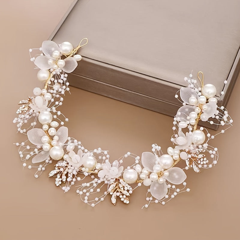 Vintage-style faux pearl flower tiara for brides, fairy princesses, and boho brides. Add a touch of elegance to your wedding hair with this beautiful headband.