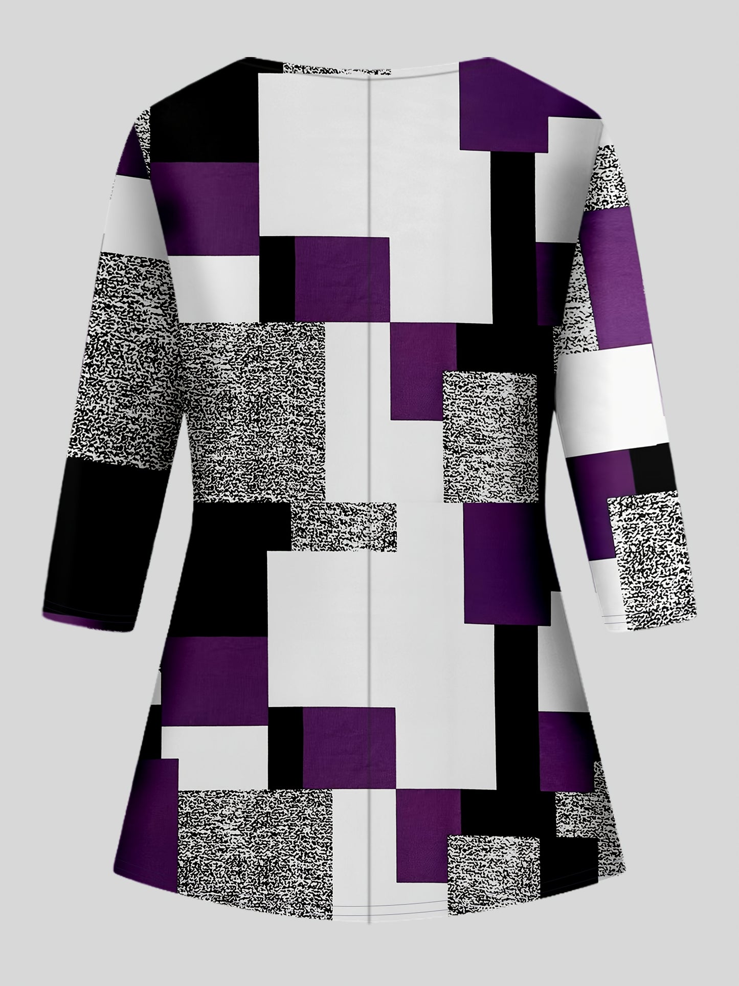 Geometric print top with long sleeves paired with solid color pants set for plus-size women.