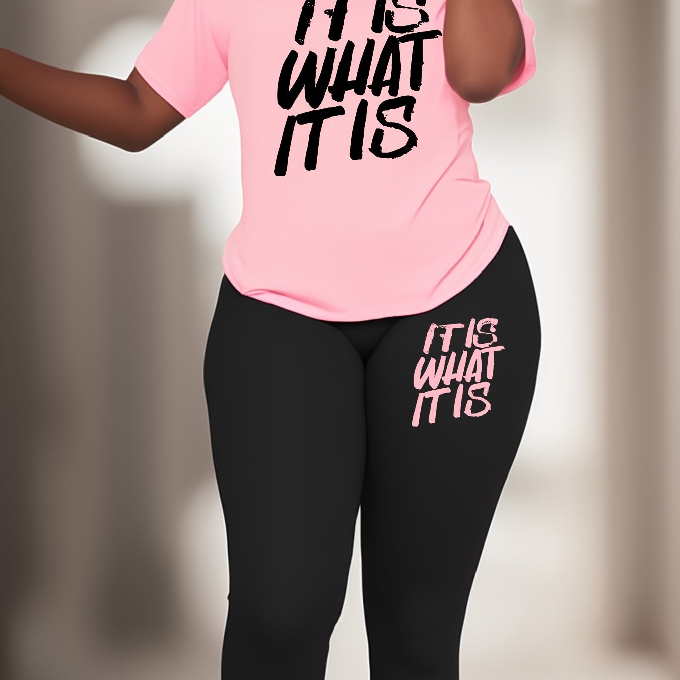 Plus Size Sports Set with slogan print. Polyester knit fabric with elastane for medium stretch. Crew neck activewear lash set.