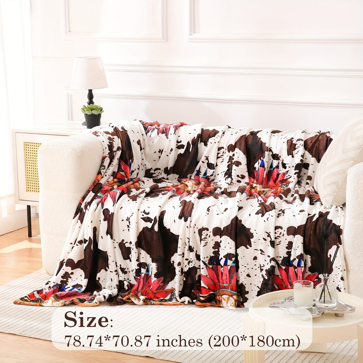 Get cozy with this soft and warm cow print blanket. Perfect for adding a touch of whimsy to your sofa, couch, or bed, this lightweight throw is made from plush flannel fleece. It's a great gift idea for any cow lover and perfect for all seasons.