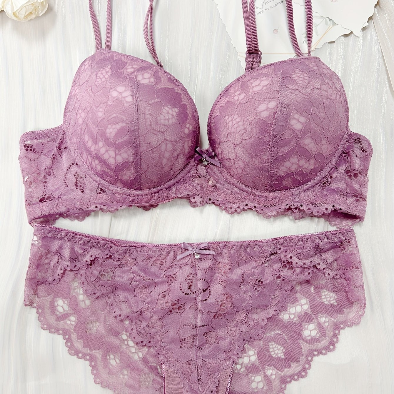 Romantic purple women's bra set with lace lingerie for support and lift.