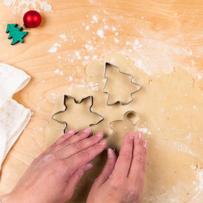 This set of stainless steel cookie cutters and molds has a festive Christmas theme and includes 10 shapes: bell, snowflake, Christmas stocking, crutch, Christmas tree, heart, star, house, moon, and angel.