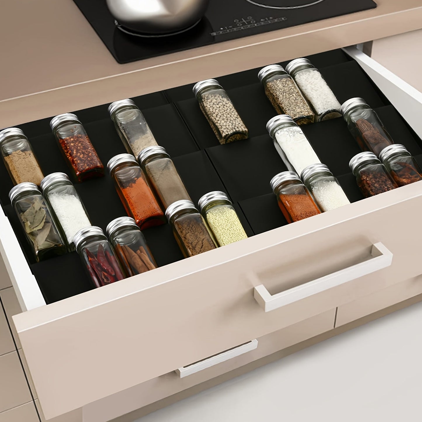 The TheaPro Adjustable Plastic Spice Drawer Organizer comes in a convenient 2-pack, with an expandable 4-tier design that fits neatly in kitchen cabinet drawers or countertops. This seasoning rack tray insert requires no assembly, making it easy to start