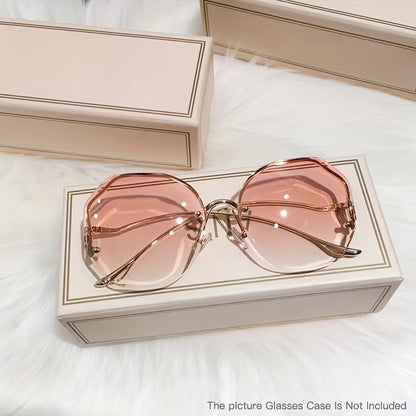 Luxury frameless round glasses for women with stylish gradient lenses and metallic finish.