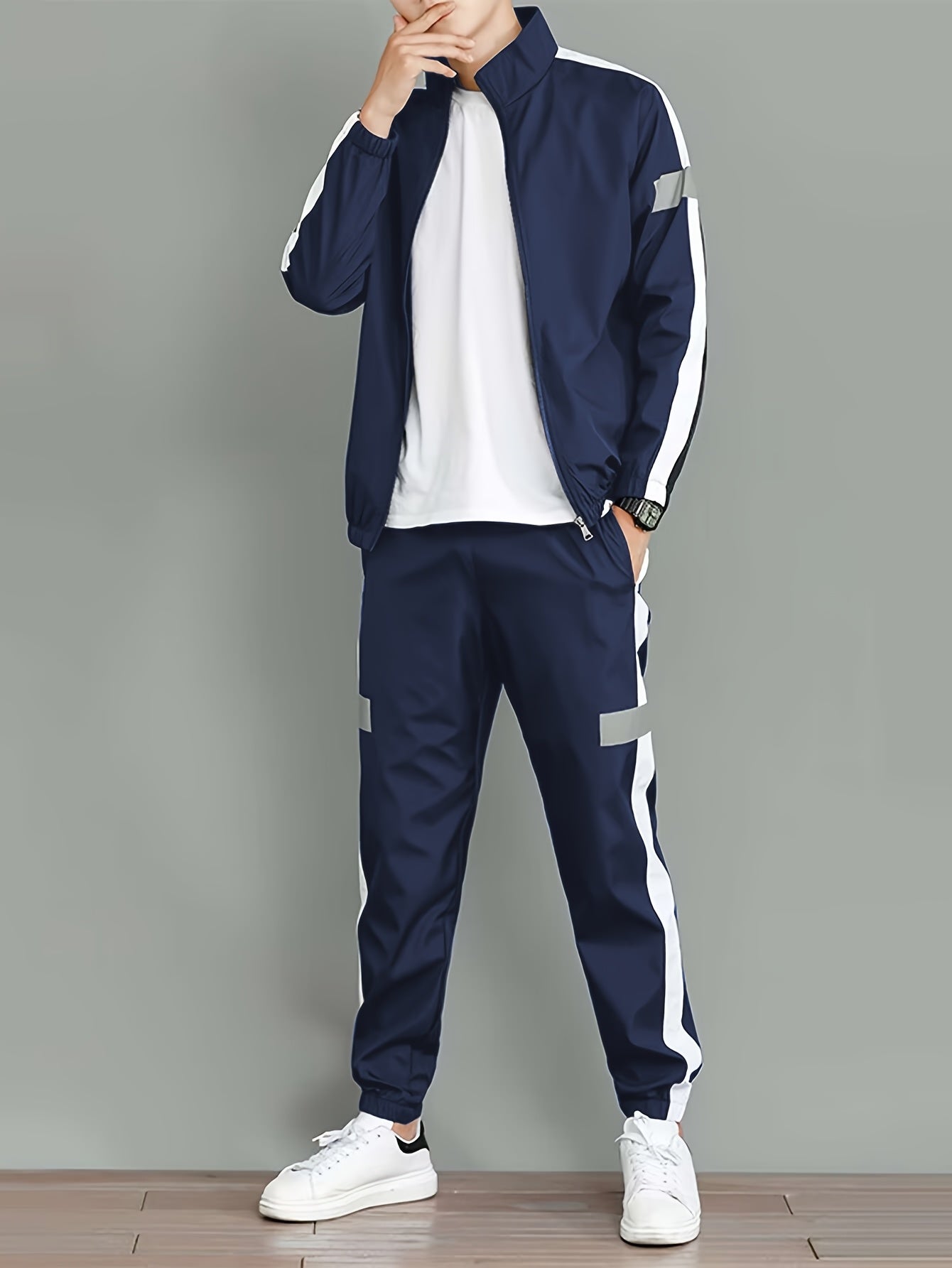 Stylish men's casual set with jacket and loose pants, ideal for spring and autumn activities.