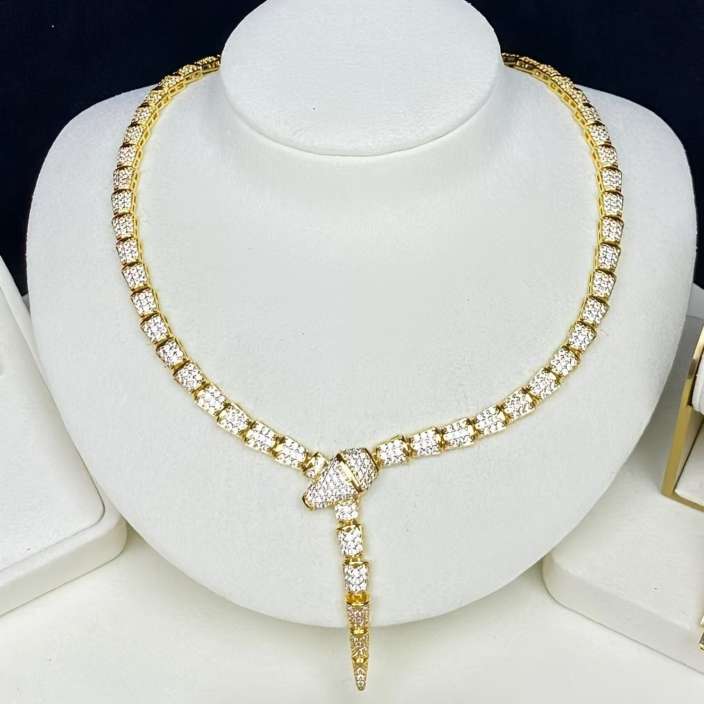 Stunning 18K Gold Plated Copper Jewelry Set featuring AAA Zirconia Stones, featuring a Seductive Snake Design Necklace and Ring. Suitable for both Everyday Wear and Special Occasions, an Ideal Gift for Women, especially during Ramadan.