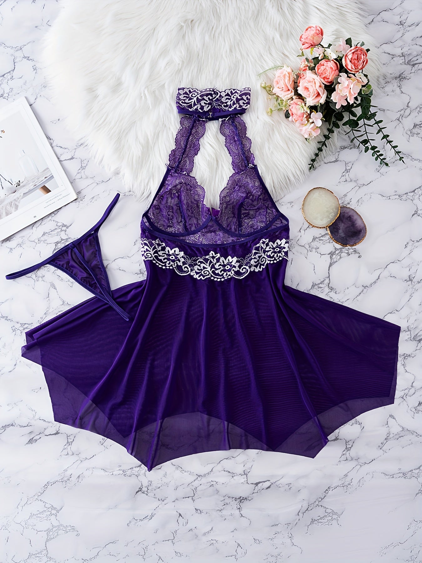 Elegant lace halter top nightgown and lingerie set for women made of polyester and elastane blend. Features solid color with bow detail, knit fabric with no chest pad or belt.