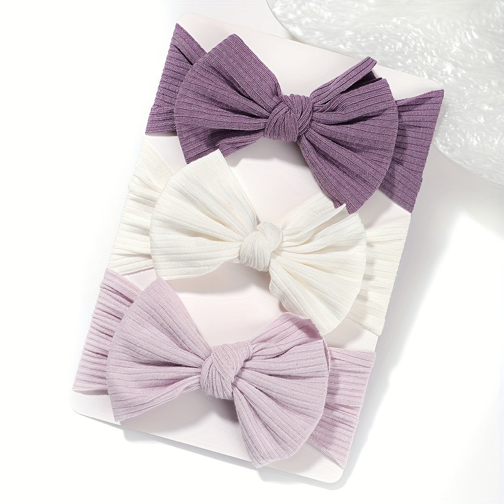 3 soft and stretchy bow hairbands for girls made of comfortable polyester, ideal for hairstyling