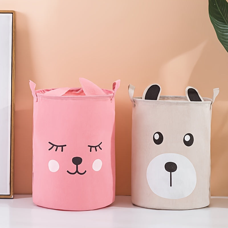 Waterproof fabric toy storage bin with cute cartoon design for kids' toys organization.