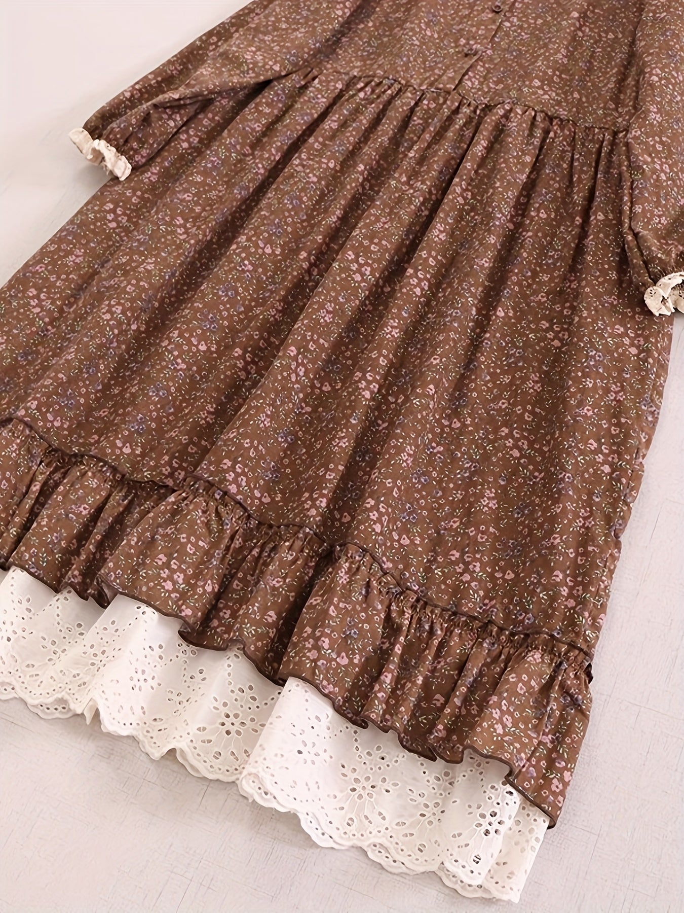 Japanese style floral long-sleeved dress with lace splicing, large hem, and linen skirt for women in Mori Girl's literary style.