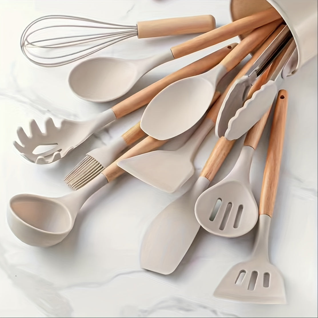 Set of 12 silicone utensils with khaki color and wooden handles, ensuring safety while cooking. These non-stick kitchen tools are washable and modern, providing a range of cookware and gadgets for your kitchen.