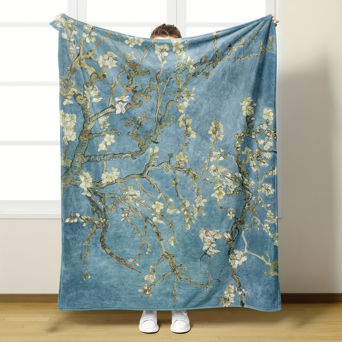 Almond Blossom Pattern Flannel Blanket - Soft and Warm, Perfect for All Seasons

This versatile blanket is ideal for use in the office, while camping, or while traveling. It makes a great gift for anyone who loves to stay cozy and comfortable.