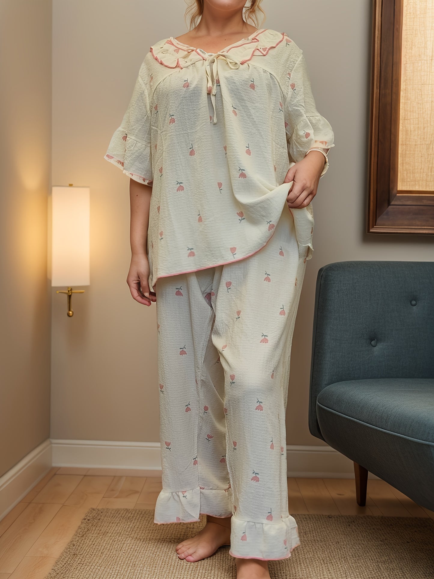 Women's printed pajama set with long pants and short sleeves in large size.