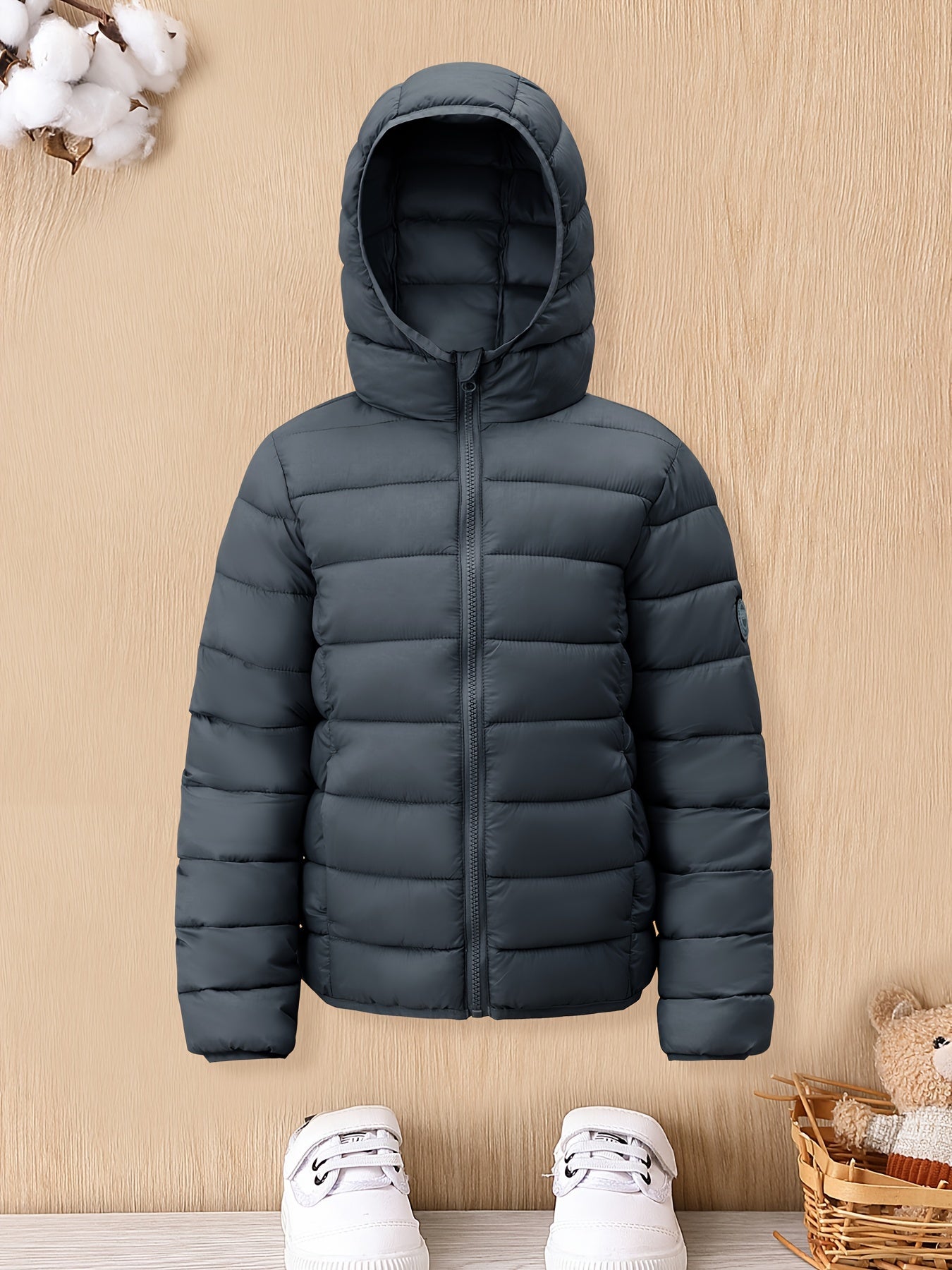 Boys' cozy hooded zip-up coat ideal for chilly weather.