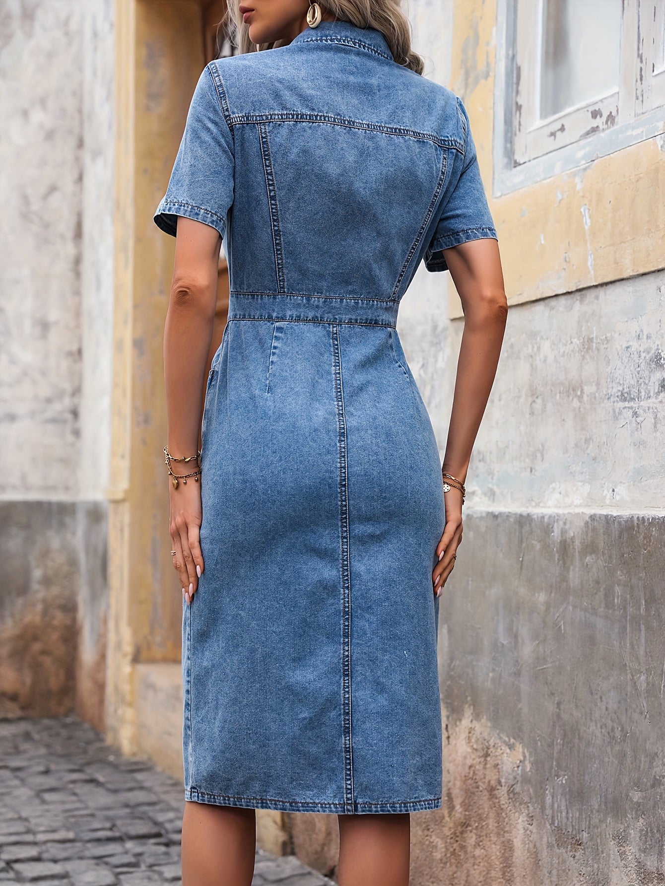 Casual denim dress for women: mid-length, short sleeves, button-up front, flap pockets, light blue.