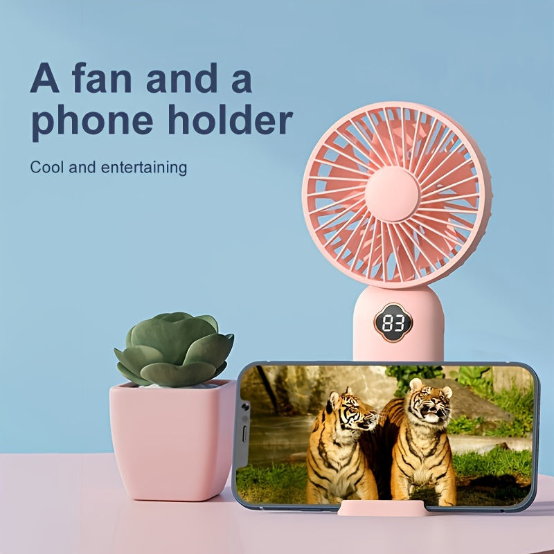 Portable table fan with USB charging and phone holder, lithium battery, quiet operation, 3 speeds, suitable for indoor use. Features intelligent digital display, made of plastic with button control and various components.