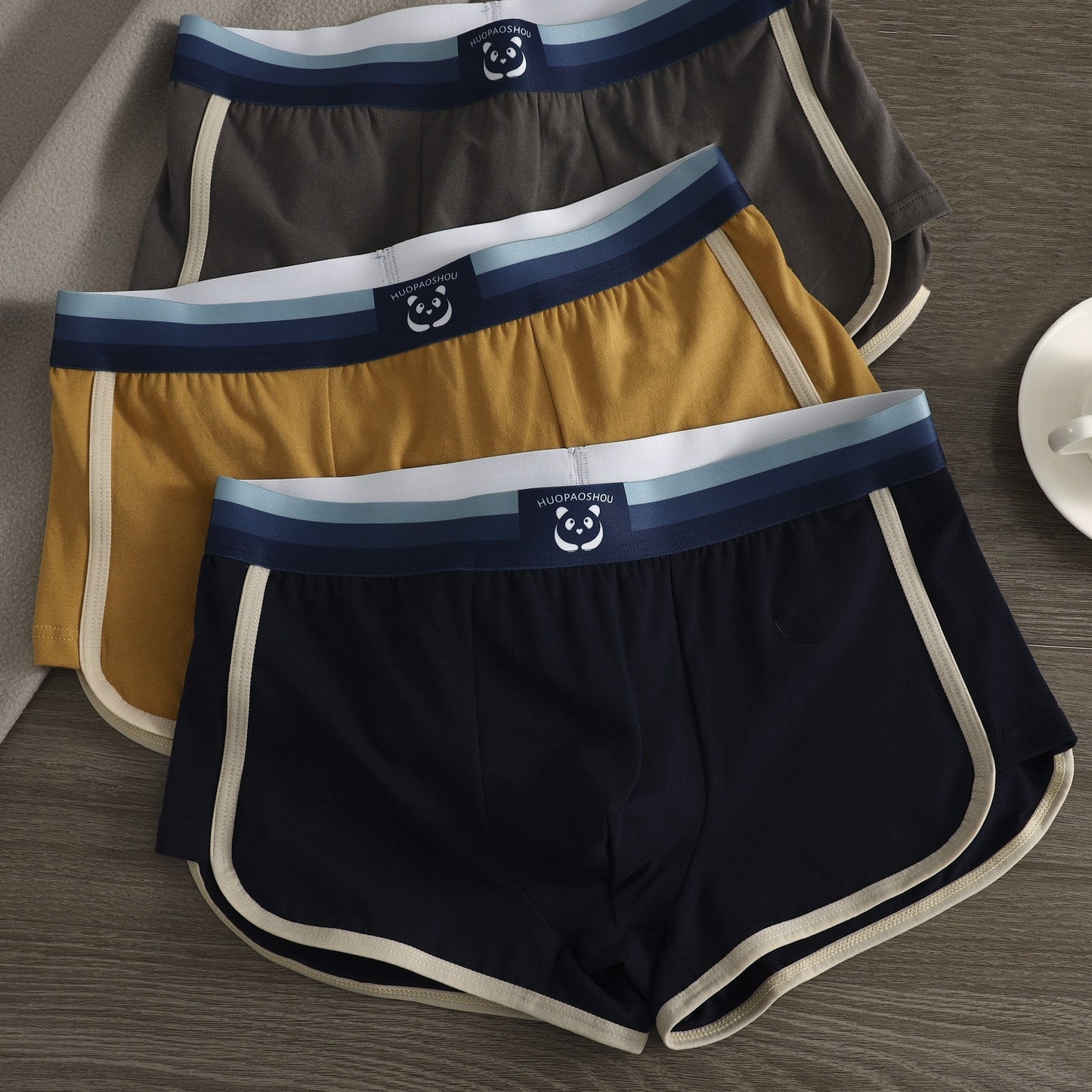 3 men's cotton boxer briefs for a comfortable fit with solid color, breathable, and stretchy material.