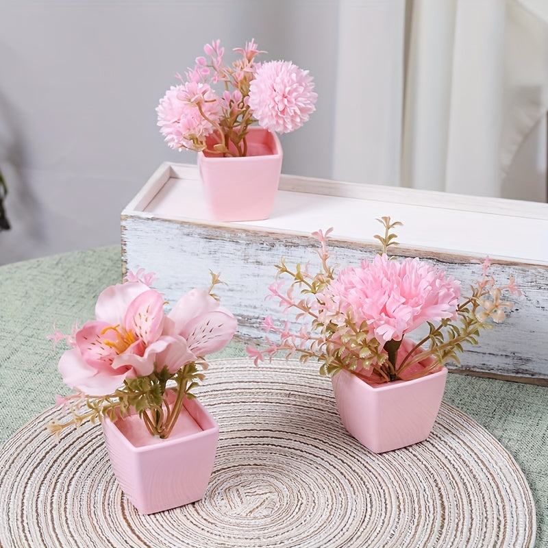 3 mini pink potted plants with faux rose and peach embroidered ball flowers for wedding, home, or office decoration.