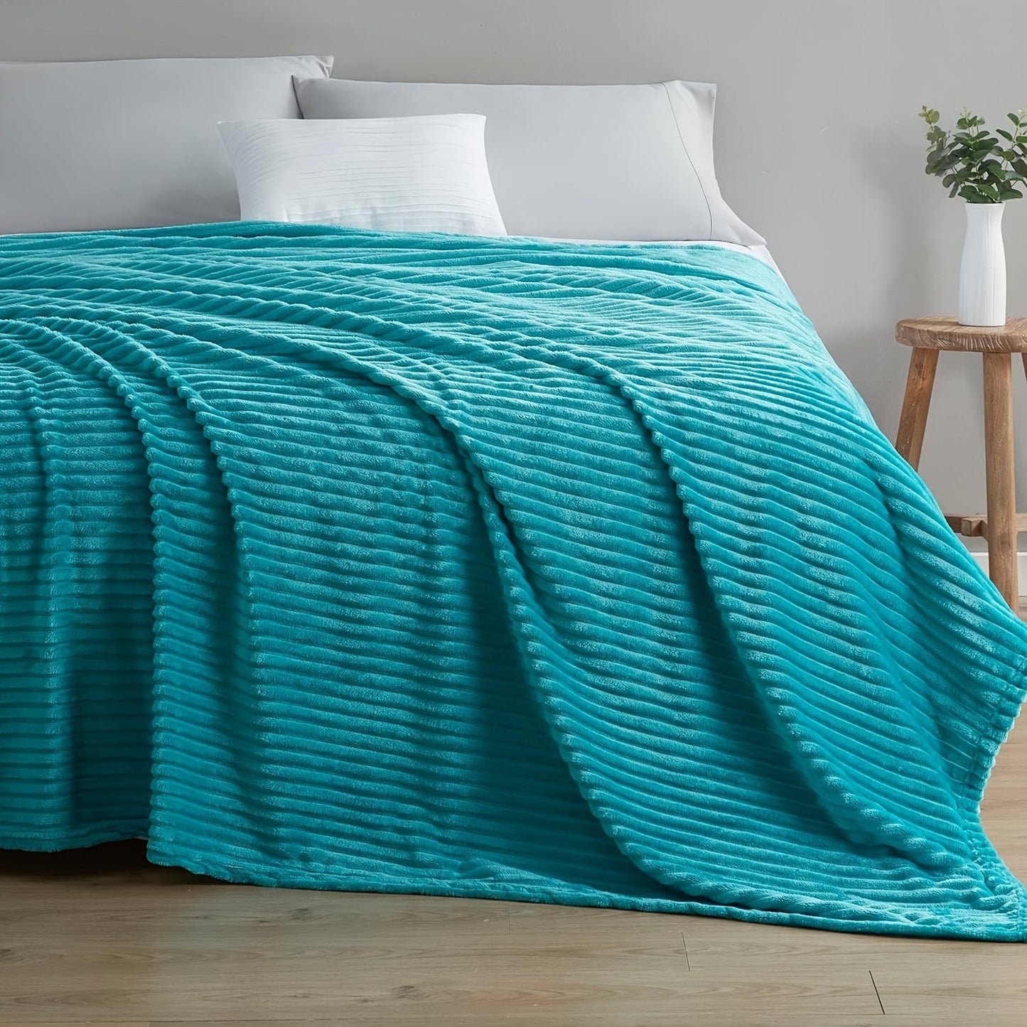 Stay cozy and warm with our Ultra-Soft Oversized Fleece Throw Blanket. Made with lightweight and warm 280GSM microfiber, this blanket features a 3D ribbed Jacquard design for added style. Hypoallergenic and perfect for all seasons, this blanket is a