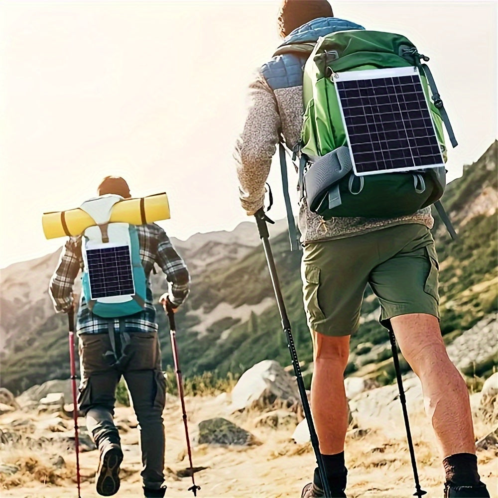 Compact dual USB solar charger, perfect for camping and home use.