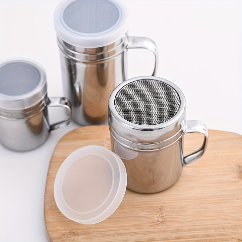 Multipurpose stainless steel spice jar with handle and lid, perfect for storing sugar, cinnamon, pepper, salt, and spices in homes, cafes, and restaurants.