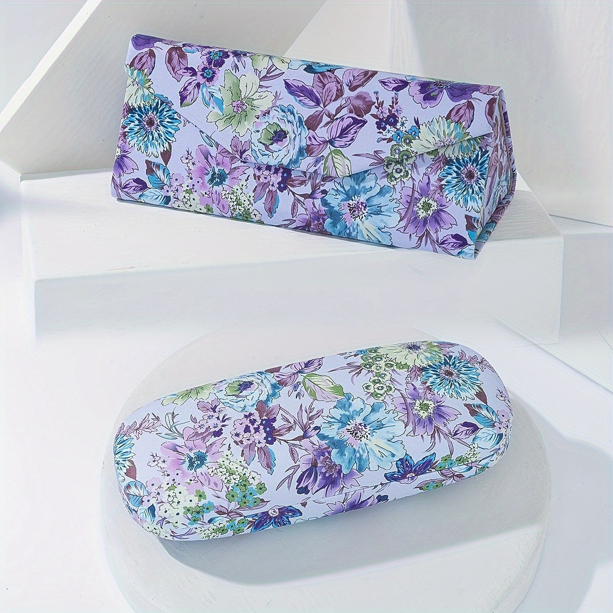 Set of 2 Eyeglass Cases: Floral design with 1 foldable case and 1 metal hard case for glasses storage.