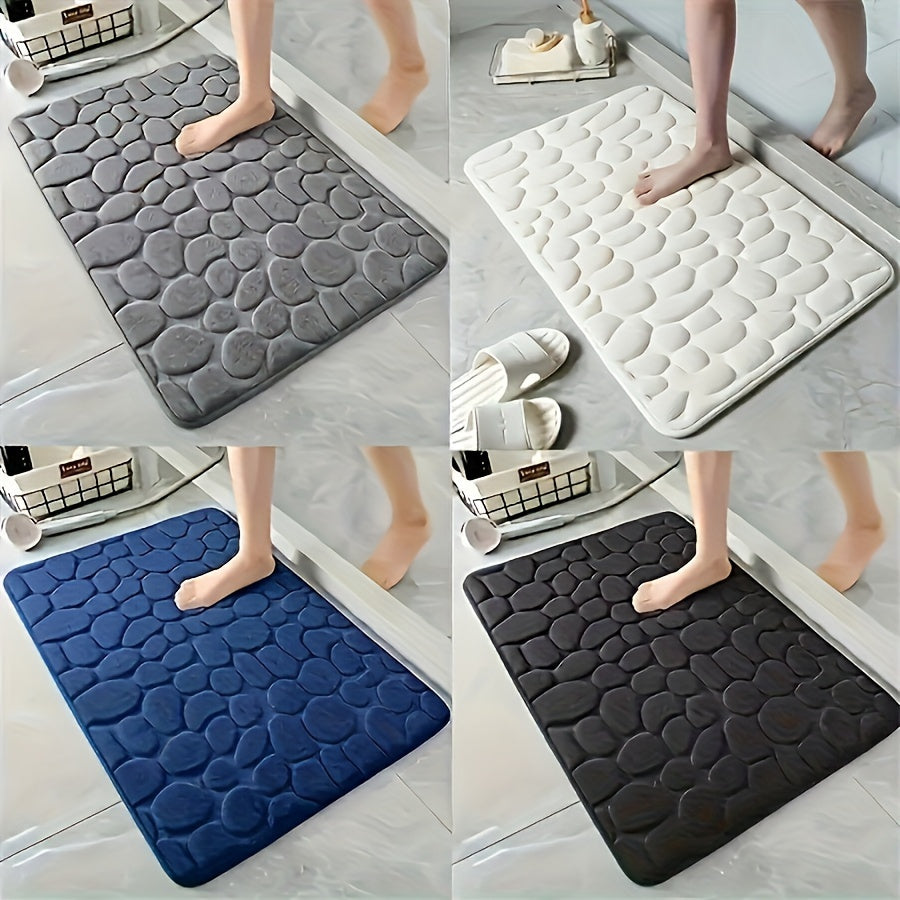 One piece of bath mat with embossed pebble pattern, highly absorbent and non-slip for bathroom use. Suitable for tub, toilet, and floor, made of machine washable polyester material. Dimensions are 59.94x39.88 cm.