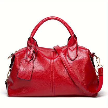 Stylish shoulder bag with removable strap and zip closure, perfect for everyday use.