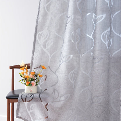 Elegant and contemporary gray floral sheer curtain with a rod pocket design, perfect for enhancing the decor of your living room, bedroom, or home.