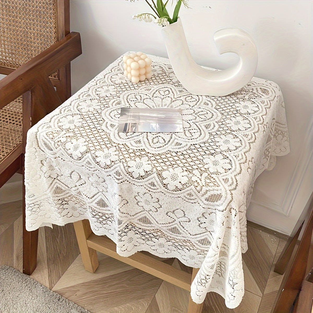 Polyester lace tablecloth for kitchen and dining decor, featuring elegant floral design.