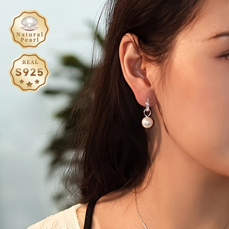 A Pair of Pearl Earrings in a Gift Box - A Must-Have Gift for Women. These fashionable hoop earrings are made of S925 Silver with 10-11mm round natural freshwater pearls. The pearls are removable and add a graceful touch to any outfit. Please note that