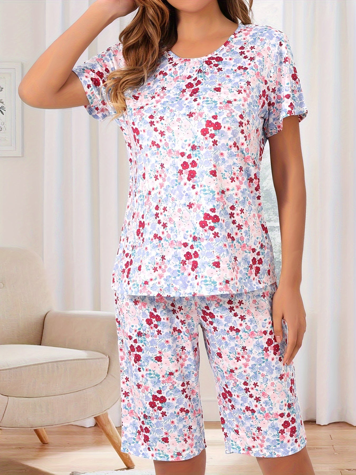 Floral print 2-piece pajama set for women with round neck top and shorts, perfect for summer sleepwear.