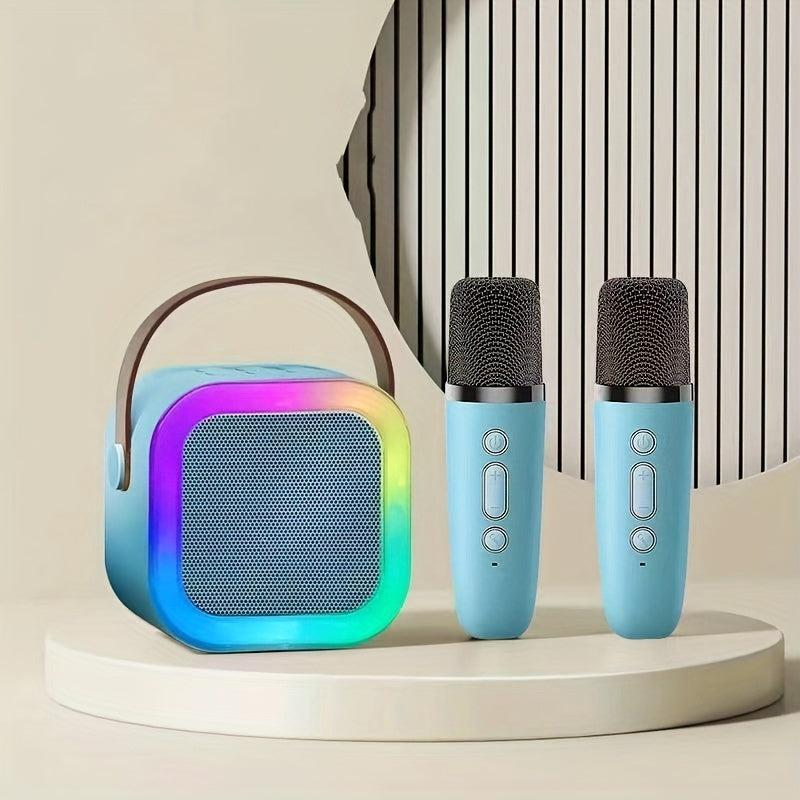 Portable mini karaoke machine with 2 wireless mics ideal for youngsters' birthday parties and family fun, USB rechargeable speaker.