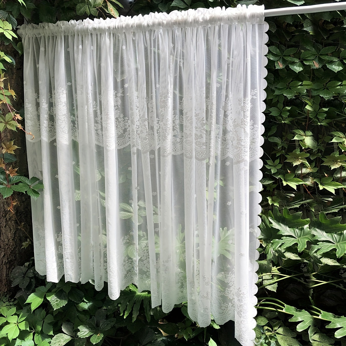 One piece of Romantic White Lace Curtain Panel, with adjustable length and machine washable. Featuring a delicate floral pattern, perfect for adding a touch of elegance to your bedroom, kitchen, or coffee shop decor.